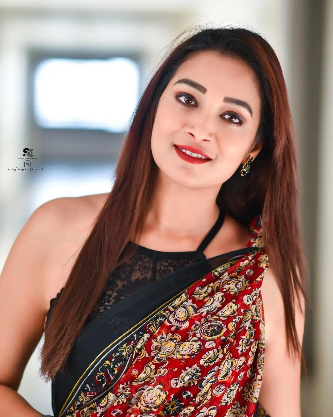 Bhanu Sri Wearing Maroon Saree Sleeveless Black Blouse